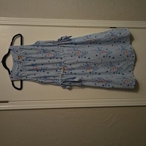 Juicy Couture  size medium dress, colors are light blue & pink flowers and gold